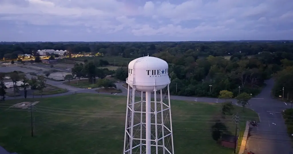 The Fort Athletic Club, water tower at dusk